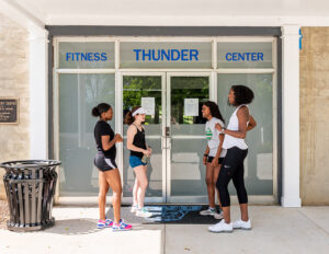 students exercising outside thunder fitness center