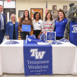 Wesleyan faculty at Tellico signing