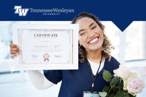 Tennessee Wesleyan University student smiling with their achievement with graphic
