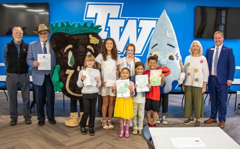 TWU and City of Athens pose for photo during the Tree Campus USA and Tree City USA presentation