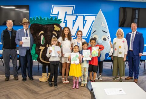 TWU and City of Athens pose for photo during the Tree Campus USA and Tree City USA presentation