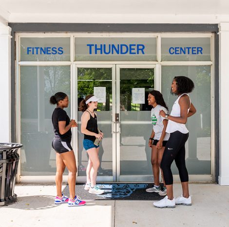 students exercising outside thunder fitness center